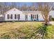 Charming single-story home with a well-manicured lawn and a welcoming front entrance at 4247 Windward Ln, Norcross, GA 30093