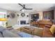 Comfortable living area with fireplace, piano, and stylish decor at 4247 Windward Ln, Norcross, GA 30093