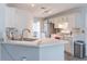 Modern kitchen with stainless steel appliances, backsplash, and ample counter space with sink at 539 Riverbirch Trce, Stone Mountain, GA 30087
