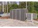 Durable shed with double doors and secure closure for storing outdoor equipment at 539 Riverbirch Trce, Stone Mountain, GA 30087