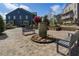 Charming outdoor community space featuring a stone water feature and ample seating at 825 Maplewood Dr, Roswell, GA 30075