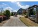 Inviting community area with benches, seating, landscaping, and relaxing atmosphere at 825 Maplewood Dr, Roswell, GA 30075