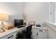 Bright office nook with a built-in desk, ample storage, and a minimalist design at 825 Maplewood Dr, Roswell, GA 30075
