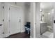 Convenient mud room with built-in bench, storage, and adjacent bathroom at 825 Maplewood Dr, Roswell, GA 30075