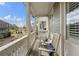 Charming porch with rocking chairs offering views of the community and street at 825 Maplewood Dr, Roswell, GA 30075