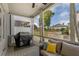 Outdoor porch features comfortable seating, a grill, and views of the community at 825 Maplewood Dr, Roswell, GA 30075