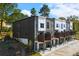 Modern townhomes with multiple stories and private balconies, plus green landscape at 2328 Mason Drive Dr, Atlanta, GA 30316