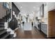 Open-concept home featuring modern kitchen and staircase at 2328 Mason Drive Dr, Atlanta, GA 30316