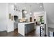 Bright, stylish kitchen with island seating, modern lighting, and stainless steel appliances at 2328 Mason Drive Dr, Atlanta, GA 30316