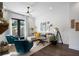 Modern living room with shiplap accent wall, hardwood floors, and stylish furnishings at 2328 Mason Drive Dr, Atlanta, GA 30316