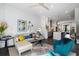 Bright open-concept living room flowing to kitchen with stylish furnishings and decor at 2328 Mason Drive Dr, Atlanta, GA 30316
