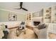 Cozy living room featuring a fireplace, built-in shelves, and neutral decor at 3664 Bonnie Glenn Ln, Tucker, GA 30084