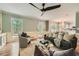 Bright living room showcasing wainscoting, hardwood floors, and stylish furnishings at 3664 Bonnie Glenn Ln, Tucker, GA 30084