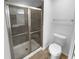 Clean bathroom with a stand up shower with glass doors at 409 Kenley Ct, Mcdonough, GA 30253