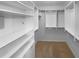 Spacious walk-in closet with custom shelving and ample storage space at 409 Kenley Ct, Mcdonough, GA 30253