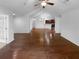 Spacious living room with hardwood floors and access to the kitchen at 409 Kenley Ct, Mcdonough, GA 30253
