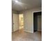 Bedroom with neutral carpet, an ensuite bathroom and a walk-in closet at 6615 Bluffview Dr, Douglasville, GA 30134