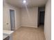 Hallway featuring carpet flooring, neutral walls and white trim and doors at 6615 Bluffview Dr, Douglasville, GA 30134