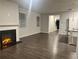 Spacious living room featuring wood flooring, a fireplace and natural light at 6615 Bluffview Dr, Douglasville, GA 30134
