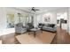 Inviting living room with large windows, comfortable seating, and an open layout at 7430 Polo Hl, Cumming, GA 30040