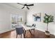 Bright office space with white walls, hardwood floors, and a modern desk setup at 7430 Polo Hl, Cumming, GA 30040