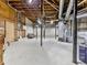 Unfinished basement with exposed beams, concrete floor, and mechanicals at 120 Huntcliff Pt, Atlanta, GA 30350