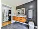 Modern bathroom featuring a floating vanity, LED mirror, and a sleek toilet at 120 Huntcliff Pt, Atlanta, GA 30350