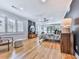 Cozy main bedroom featuring hardwood floors, modern decor, and ample natural light at 120 Huntcliff Pt, Atlanta, GA 30350