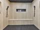 Modern shower featuring dual shower heads, built-in bench, and elegant tile design at 120 Huntcliff Pt, Atlanta, GA 30350