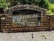 The Huntcliff On The Chattahoochee stone community sign shows a marker for the neighborhood at 120 Huntcliff Pt, Atlanta, GA 30350