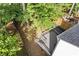 A mulit-level deck area with grill and furnishings in the home's backyard at 1379 Vintage Pointe Dr, Lawrenceville, GA 30044