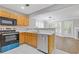 Charming kitchen flows into the living area, featuring modern appliances and abundant natural light at 1379 Vintage Pointe Dr, Lawrenceville, GA 30044
