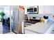 Modern kitchen featuring stainless steel appliances, gas range, and spacious countertops at 3851 Bogan Mill Rd, Buford, GA 30519