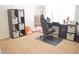 Spacious office with a work station, comfortable desk chair, a large window and built-in storage at 3851 Bogan Mill Rd, Buford, GA 30519