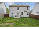 Large backyard with patio space for entertaining, enclosed by wooden fences for added privacy at 531 S Fortune Way, Dallas, GA 30157