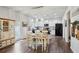 Bright eat-in kitchen features white cabinets, stainless appliances, and natural light at 531 S Fortune Way, Dallas, GA 30157