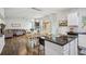 Open-concept living space with a kitchen, a dining area, and ample natural light at 531 S Fortune Way, Dallas, GA 30157