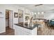 Open-concept living space with a staircase, dining area, and access to pantry at 531 S Fortune Way, Dallas, GA 30157