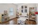 Charming playroom with a play kitchen, toy storage, and a table and chairs at 531 S Fortune Way, Dallas, GA 30157