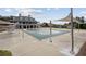 Large, covered community pool with shade structures and a building in the background at 531 S Fortune Way, Dallas, GA 30157