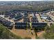 Community aerial view shows convenient location, amenities, and townhome layout at 6270 Shiloh Woods Dr, Cumming, GA 30040