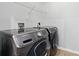 Convenient laundry room features modern Samsung washer and dryer at 6270 Shiloh Woods Dr, Cumming, GA 30040