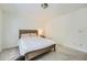 Serene bedroom with soft carpeting, a bed, and ample natural light from the window at 7155 Roswell Rd # 15, Atlanta, GA 30328