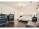 Spacious bedroom with neutral tones, a comfortable bed, and dark wood dressers for ample storage at 7155 Roswell Rd # 15, Atlanta, GA 30328