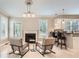 Living room featuring a fireplace with views to the kitchen at 7155 Roswell Rd # 15, Atlanta, GA 30328