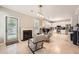 Spacious living room boasts fireplace and seating with views to the kitchen at 7155 Roswell Rd # 15, Atlanta, GA 30328