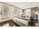 Bright living room with dark hardwood floors, neutral furnishings, and ample natural light at 7155 Roswell Rd # 15, Atlanta, GA 30328