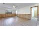 Finished basement with modern flooring, wainscoting, and natural light at 1150 Autumn Ridge Dr, Marietta, GA 30066
