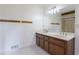 Bathroom with a double vanity and shower, plus a large mirror and convenient towel racks at 1150 Autumn Ridge Dr, Marietta, GA 30066