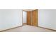 Spacious bedroom with carpet and doors, providing ample privacy and space at 1150 Autumn Ridge Dr, Marietta, GA 30066